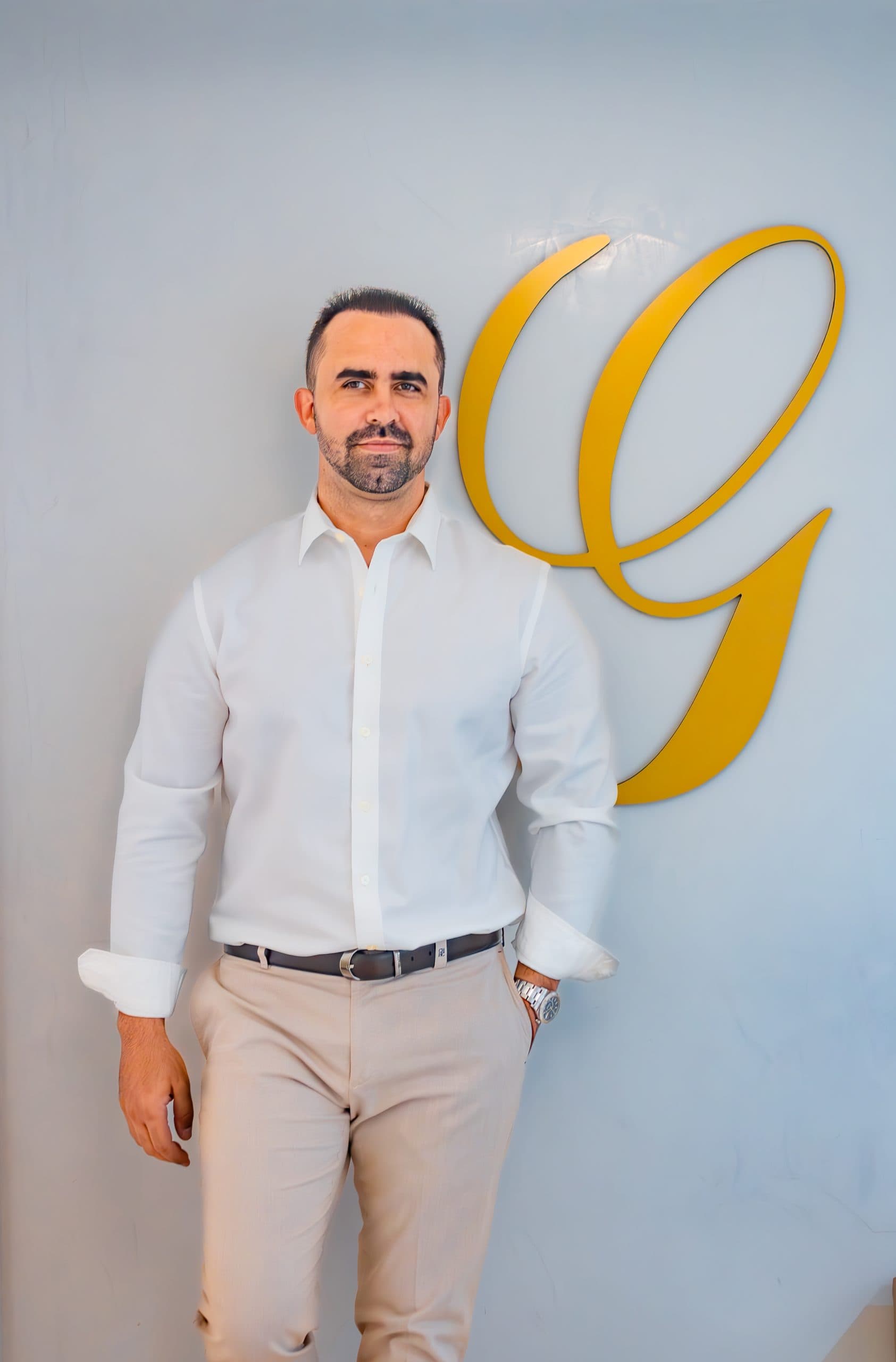 Dr. Jean Paul Giudicelli Saba standing in his clinic in Santo Domingo