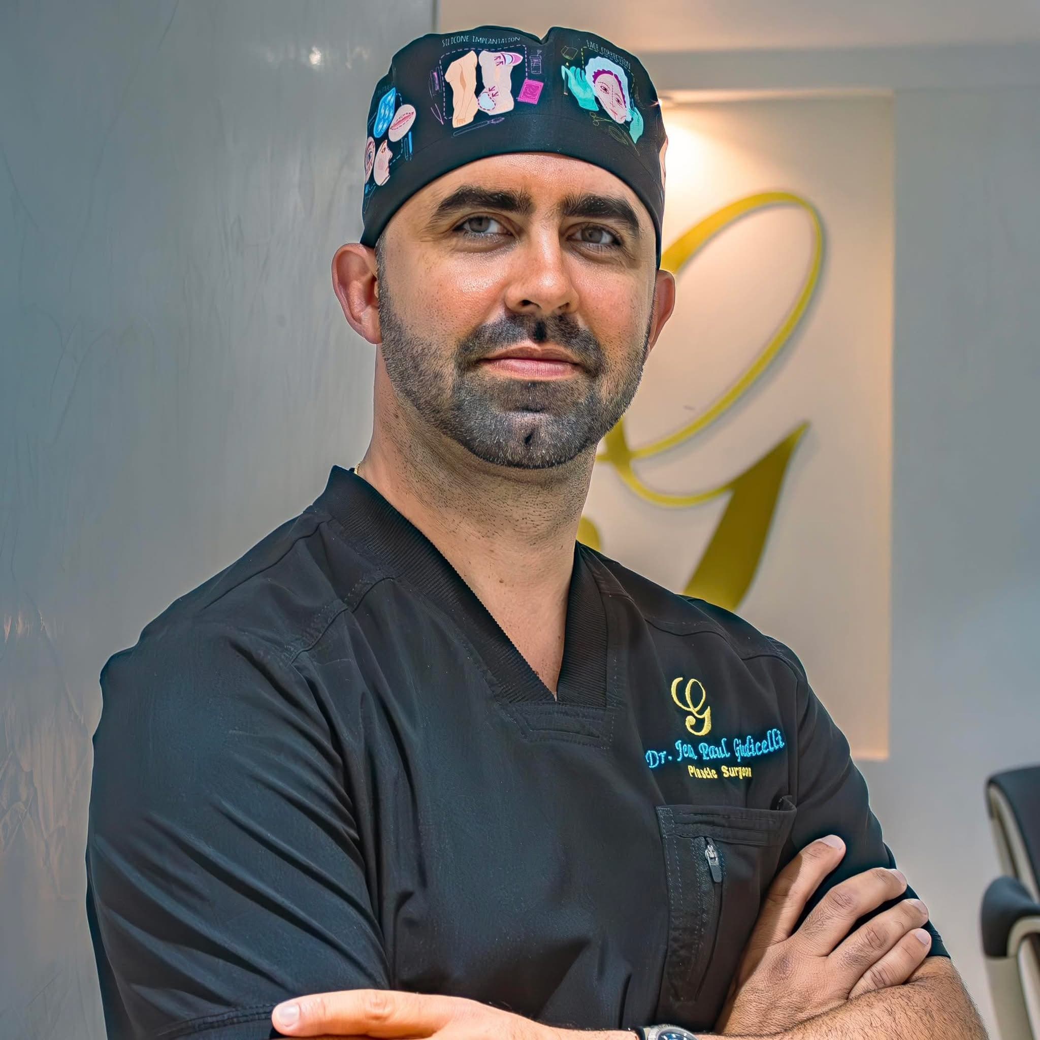 Dr. Jean Paul Giudicelli Saba in black scrubs at his clinic