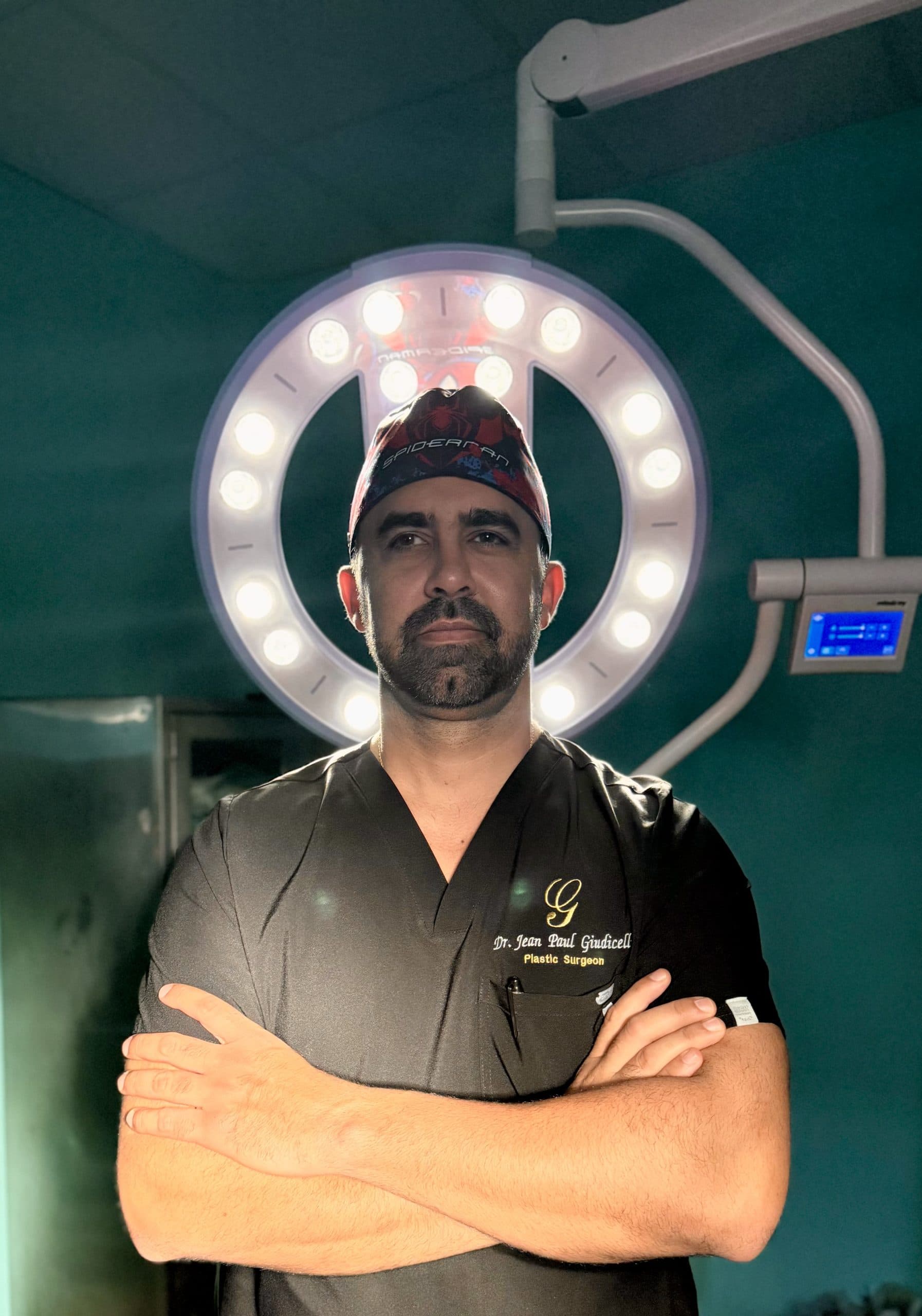 Dr. Jean Paul Giudicelli Saba under a surgical light in the operating room